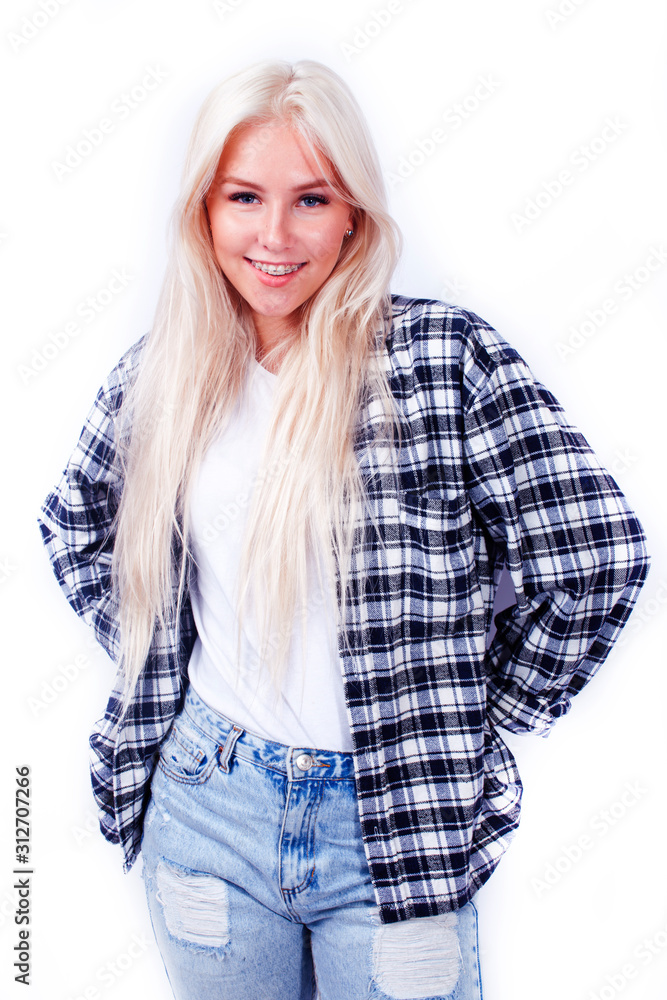 young pretty teenage hipster girl posing emotional happy smiling on white background, lifestyle people concept young pretty teenage hipster girl posing emotional happy smiling on white background, lifestyle people concept