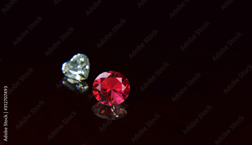 Ruby is a beautiful red gemstone on a black background. Ruby is a beautiful red gemstone on a black background.