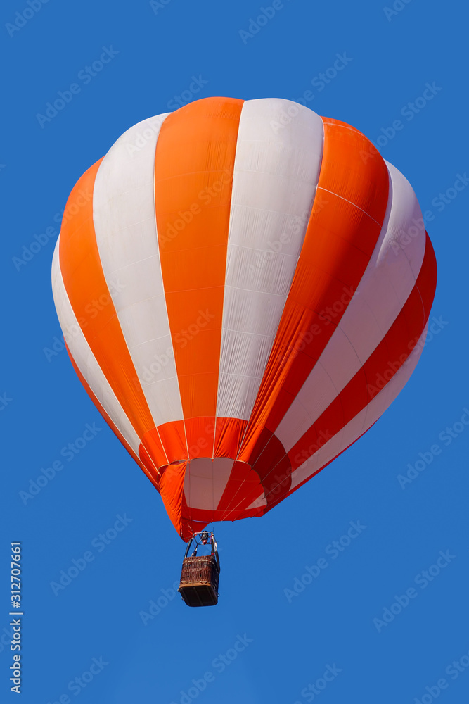 Fototapeta premium Colorful hot air balloon flying in the blue air sky