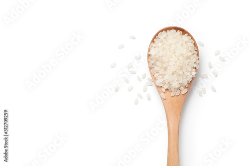 Fototapeta The rice of northeast China in a wooden spoon, Isolated on white background
