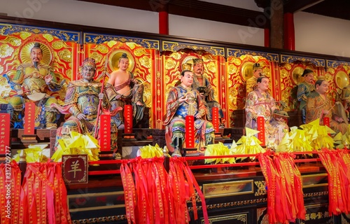 Buddha images in different shapes. Shanghai China Jade Temple September 2019 photo