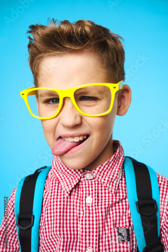 portrait of a boy in glasses