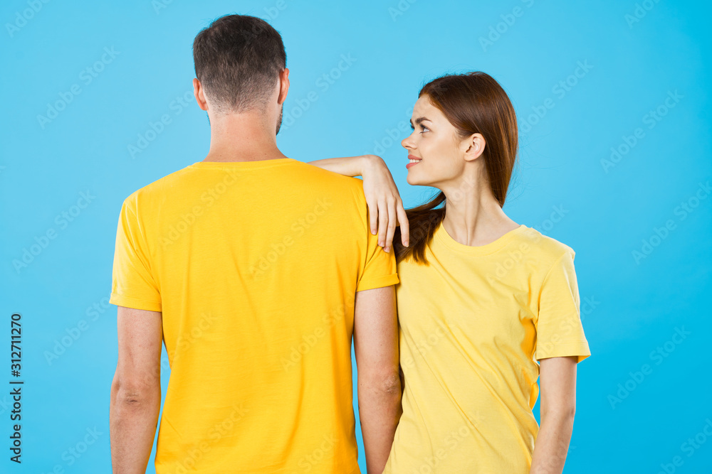 Fototapeta premium young couple in t-shirts chatting