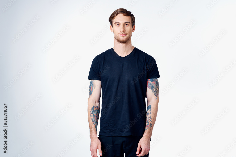 Fototapeta premium portrait of young man with arms crossed