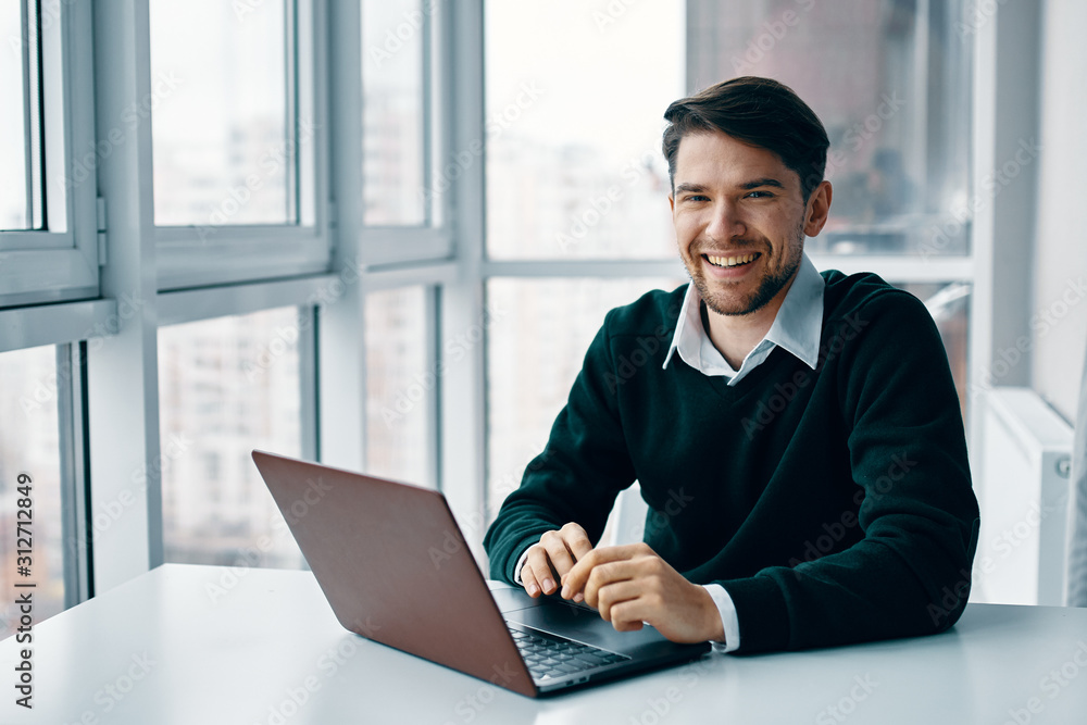 businessman working on laptop in office businessman working on laptop in office
