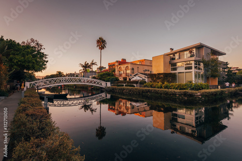 Canal and houses at sunset, in Venice Beach, Los Angeles, California photo