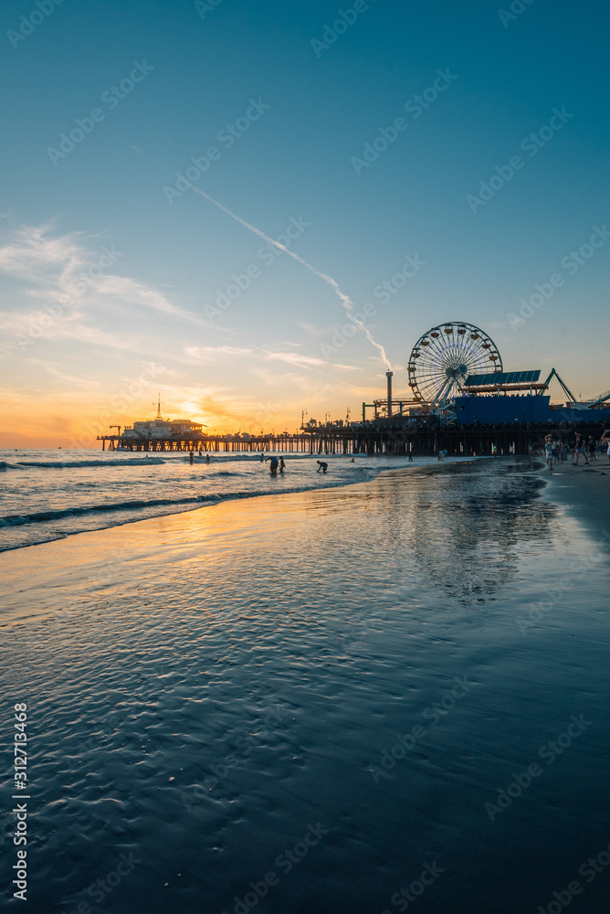 The Santa Monica Pier at sunset, in Los Angeles, California
