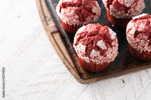 Fresh baked Red velvet muffin cupcake .