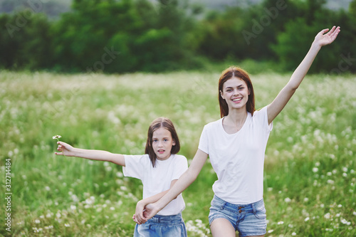 mother and daughter having fun in the park