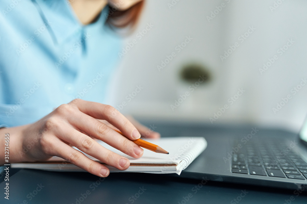 Fototapeta premium young woman using digital tablet in the office