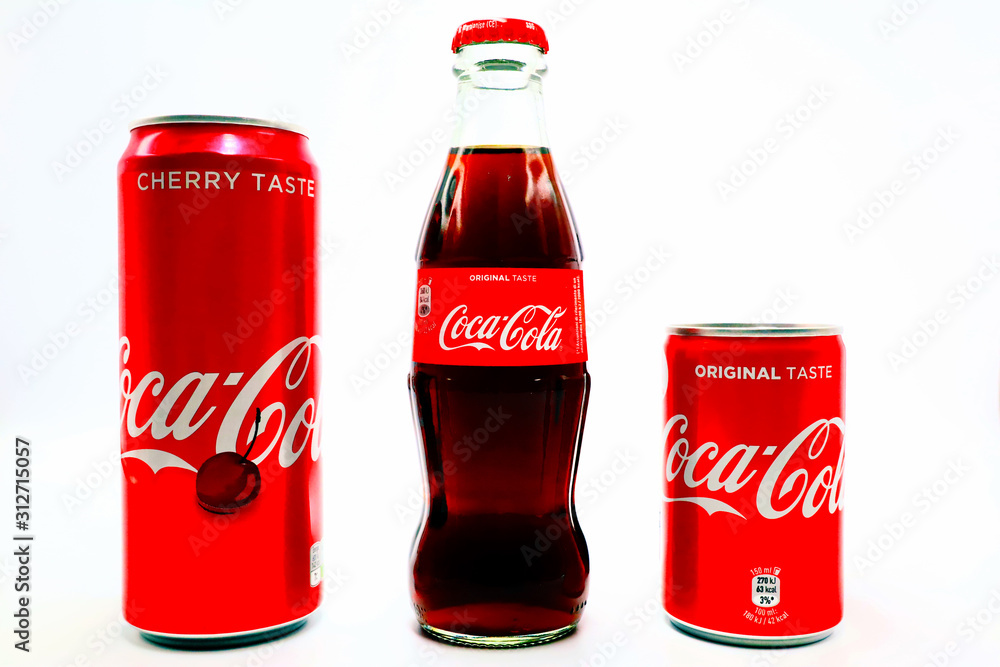 Foto Stock Italy – January 1, 2020: COCA COLA Original and Cherry Taste  bottle and Cans. Coca-Cola and the contour bottle design are trademarks of  The Coca-Cola Company | Adobe Stock