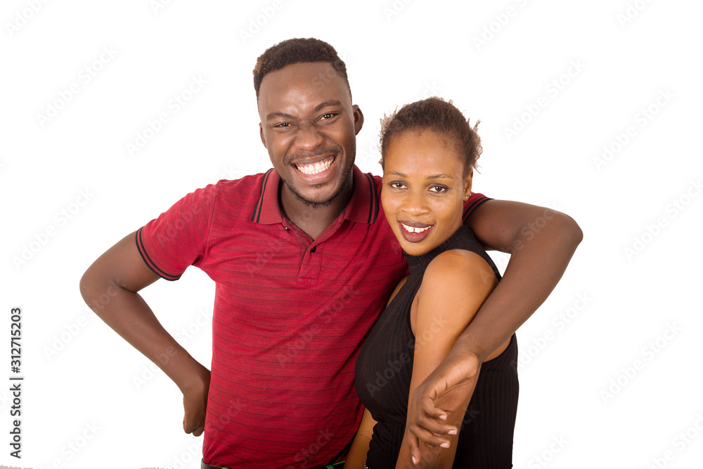 Obraz premium Young african american couple standing together and laughing