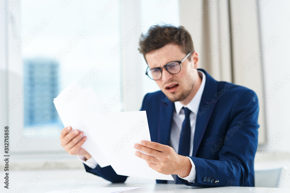 businessman working with documents in office businessman working with documents in office