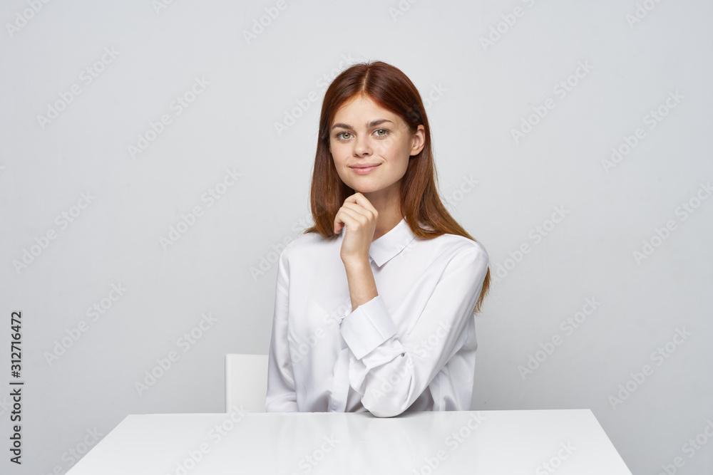 business woman sitting at desk with laptop business woman sitting at desk with laptop