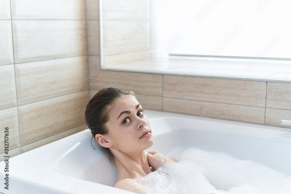 woman relaxing in bubble bath woman relaxing in bubble bath