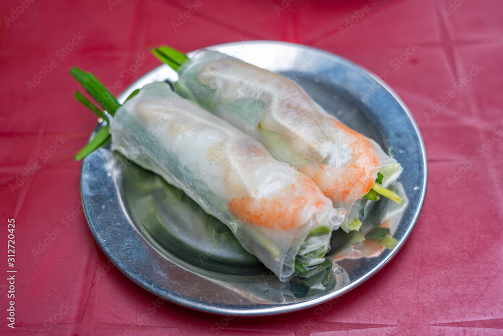 Vietnamese famous local cuisine, fresh shrimp rolls and chives Vietnamese famous local cuisine, fresh shrimp rolls and chives