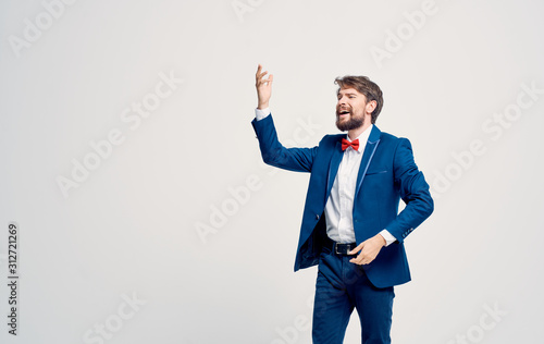 businessman with arms raised