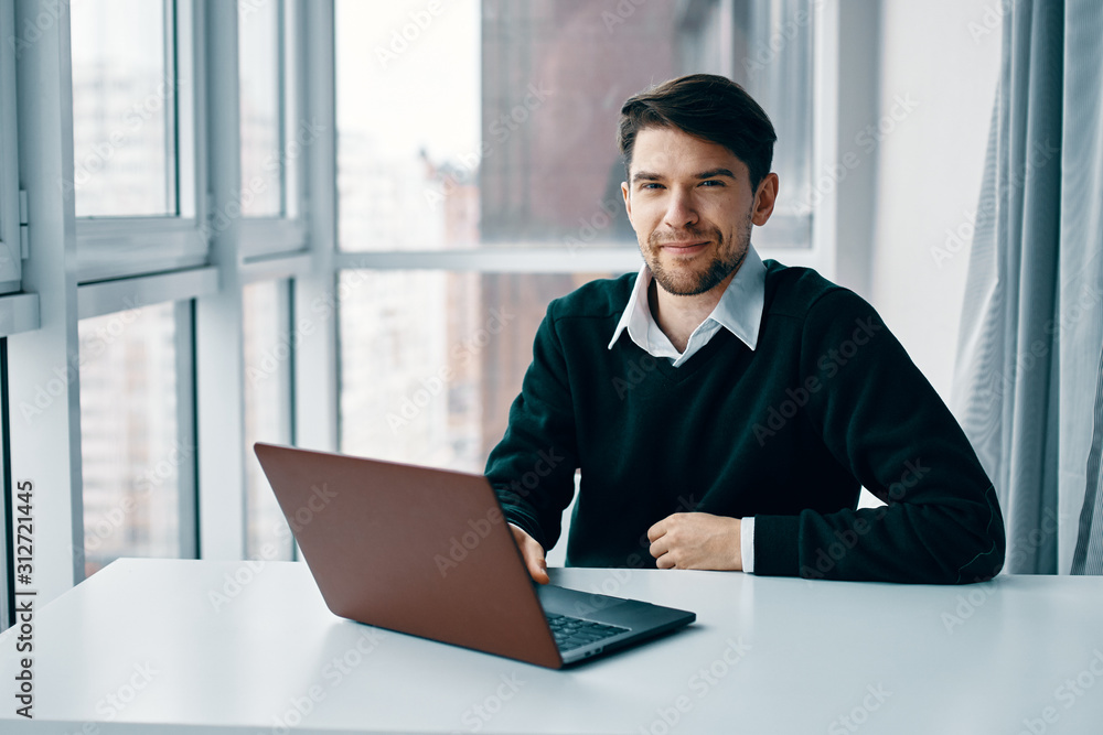 businessman working on laptop in office businessman working on laptop in office