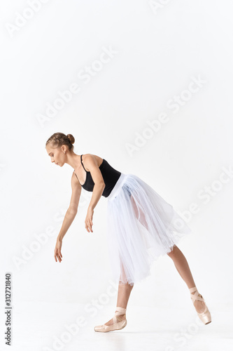 young dancer in action isolated on white background