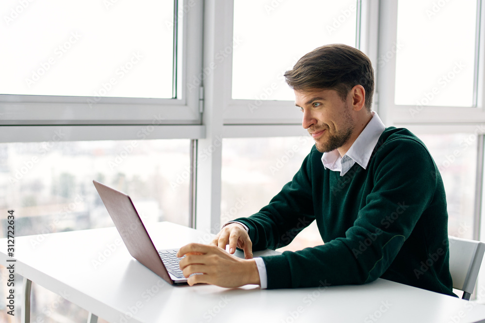 businessman working on laptop in office businessman working on laptop in office