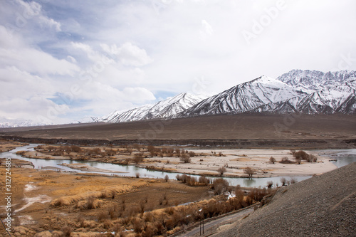 Viewpoint landscape of hight range mountain with Confluence of the Indus and Zanskar Rivers on Srinagar Leh Ladakh highway at Leh Ladakh village in Jammu and Kashmir  India at winter season