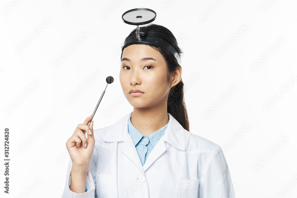 young doctor with stethoscope isolated on white