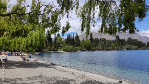 Beautiful center of Queenstown famous tourist place beautiful gorgeous Wakatipu lake Remarkable mountain range city with pubs and restaurants South island New Zealand  photo