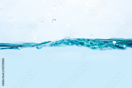 Water waves with bubbles blended in blue