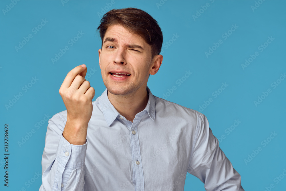 portrait of young man with thumb up portrait of young man with thumb up