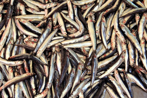 Stall with anchovies at street market in Athens, Greece