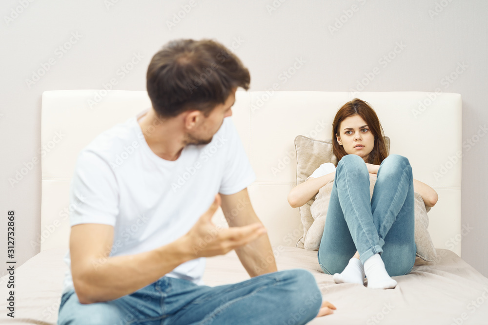 young couple sitting on sofa