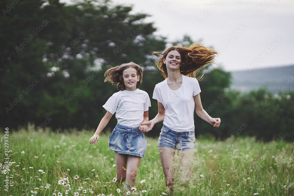 mother and daughter in the field