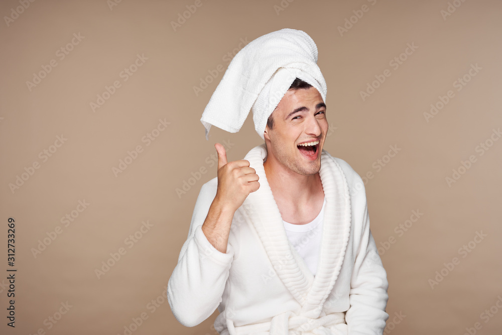 portrait of young woman with towel on her head portrait of young woman with towel on her head