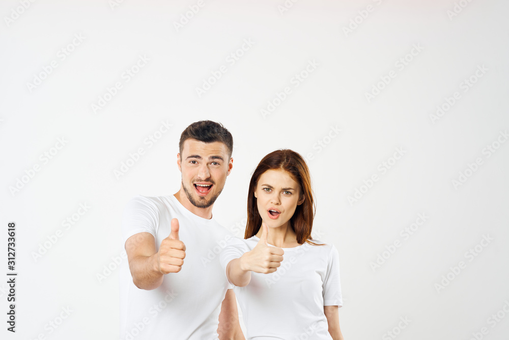 happy couple with thumbs up happy couple with thumbs up