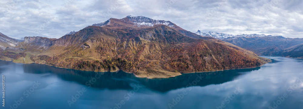 alpine lake panorama, Roselend Dam in Savoie, France in autumn