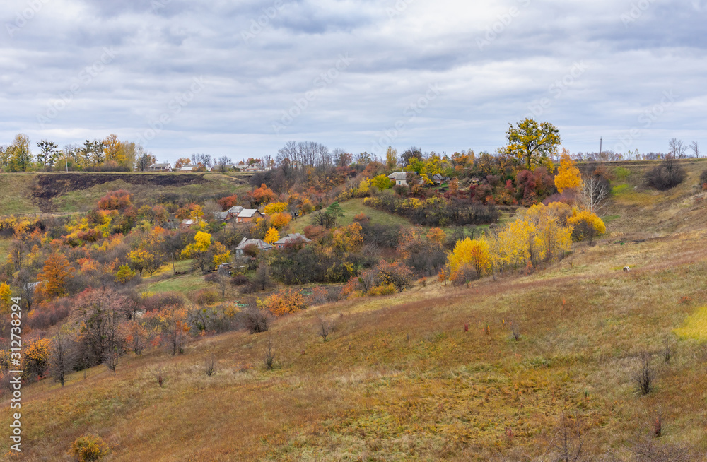 Autumnal landscape with small remote hamlet in lowland near Schpylivka village, Sumskaya oblast, Ukraine