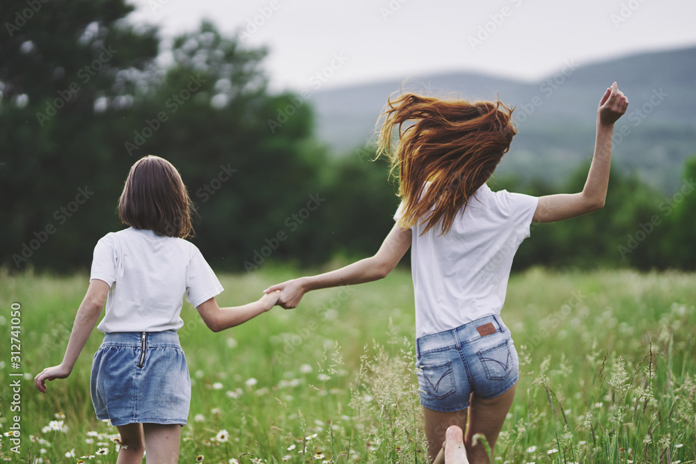 Fototapeta premium mother and daughter having fun in park
