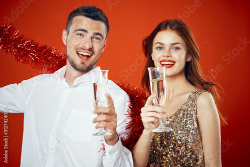 young couple celebrating with champagne