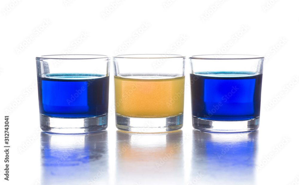 several shot glasses with different drinks, which combined represent the flag of a country several shot glasses with different drinks, which combined represent the flag of a country