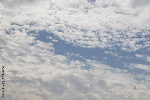 Beautiful blue sky with clouds background.