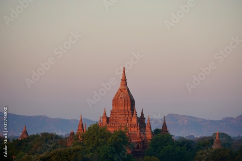 Bagan pagodas with mountains scene at sunset, Bagan, Myanmar