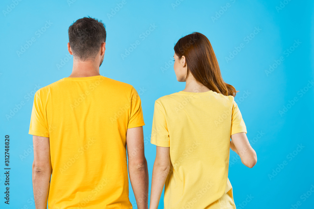 Fototapeta premium young couple in t-shirts chatting