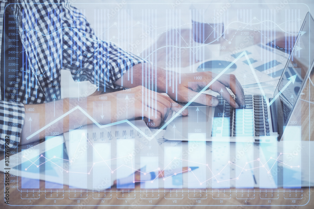 Multi exposure of stock market chart with man working on computer on background. Concept of financial analysis. Multi exposure of stock market chart with man working on computer on background. Concept of financial analysis.