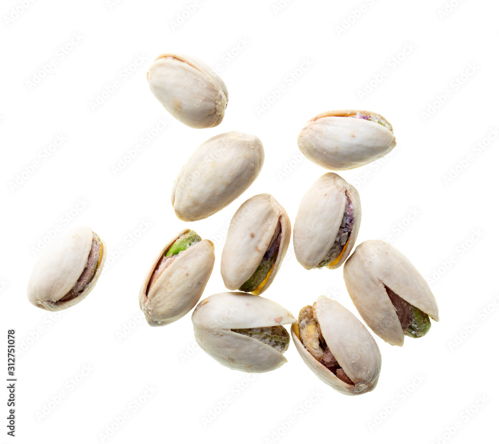 Ripe pistachios nuts isolated on a white background Ripe pistachios nuts isolated on a white background