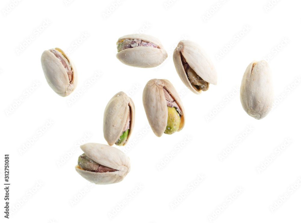 Ripe pistachios nuts isolated on a white background Ripe pistachios nuts isolated on a white background