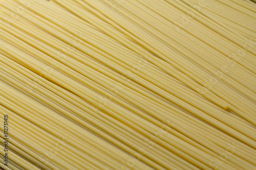 Fresh uncooked spaghetti background
