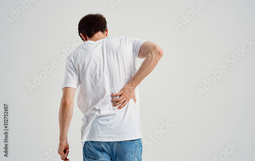 man with back pain photo