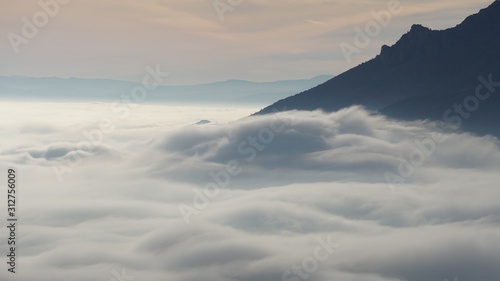 Fog at the Foot of the Mountains