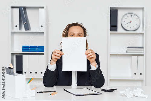 business woman holding blank card