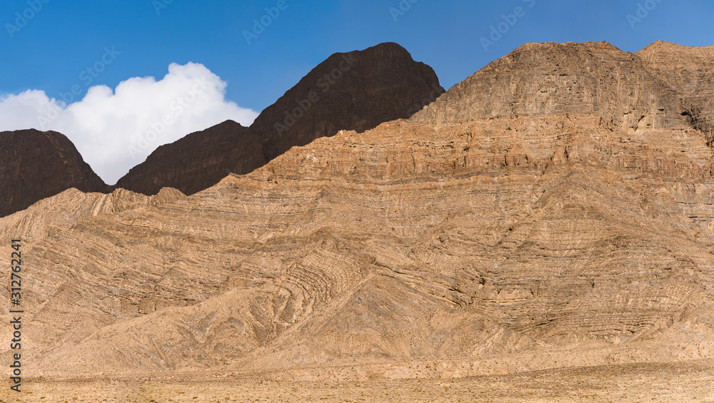 barren mountains on rocky desert landscape barren mountains on rocky desert landscape
